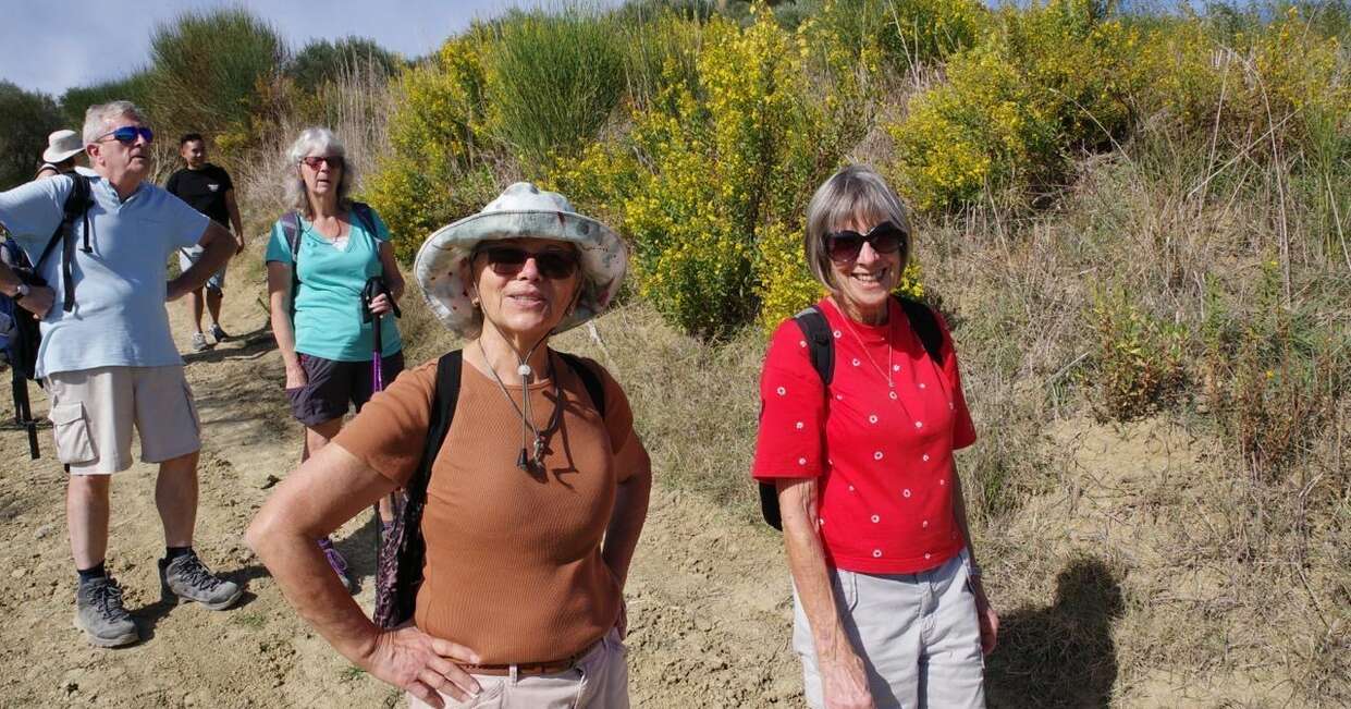 Walkers winding through Tuscany
